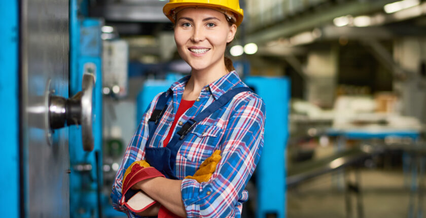 Young woman working in factory.